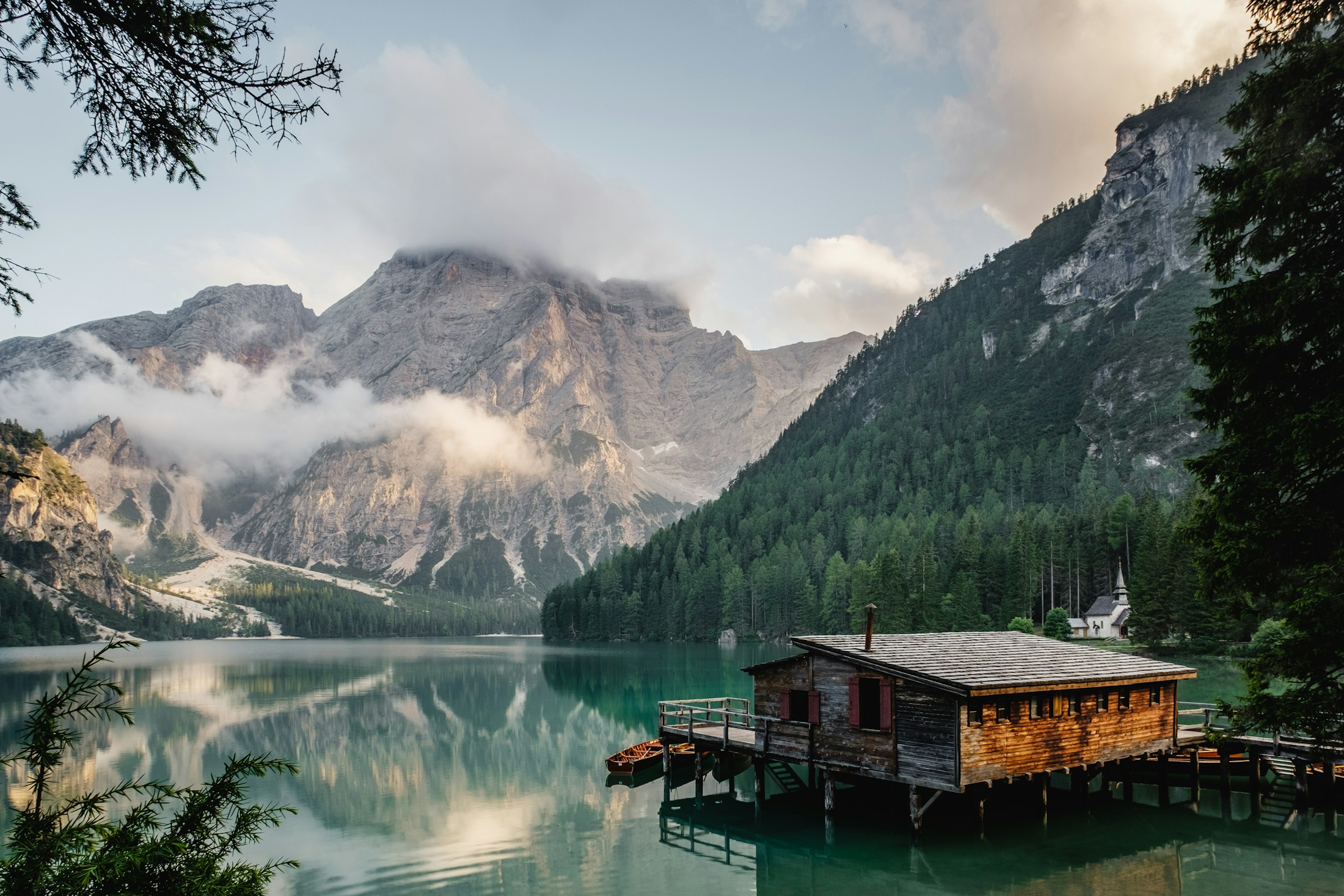 Mountain landscape, green fields, and a lake — illustrative photography, not an OSFI site